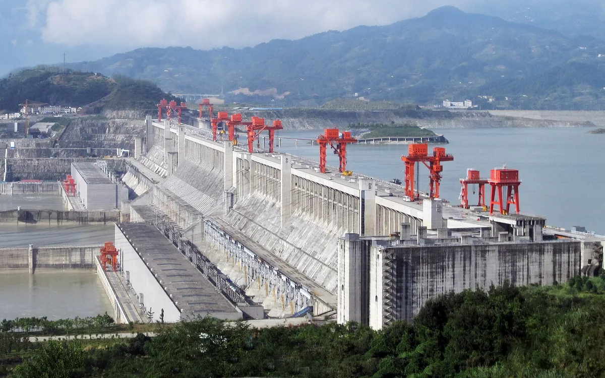 The Three Gorges Dam spanning the Yangtze River, with its spillway and gantry cranes