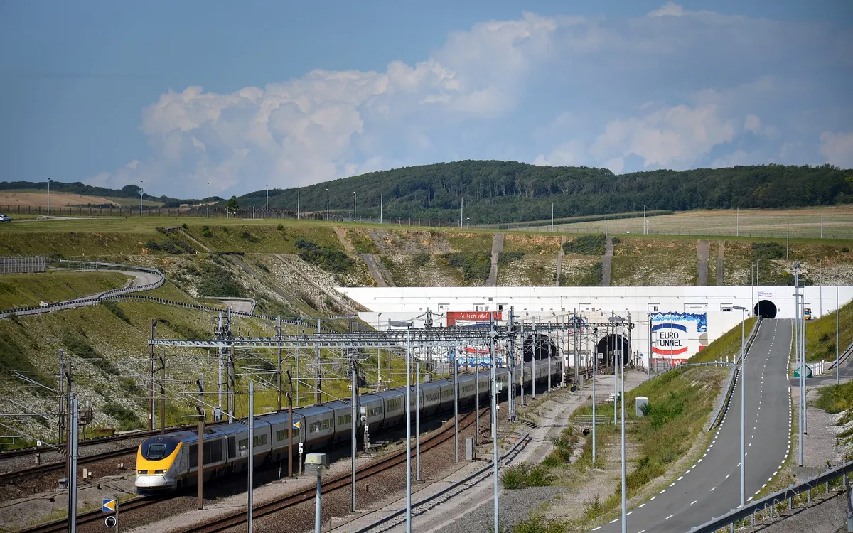 A Eurostar train emerging from the Channel Tunnel portal at Coquelles in northern France